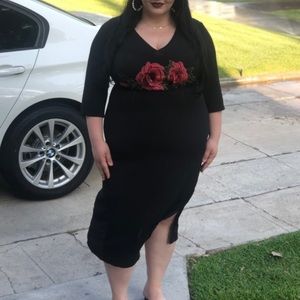 Rose embroidered black dress with a side slit